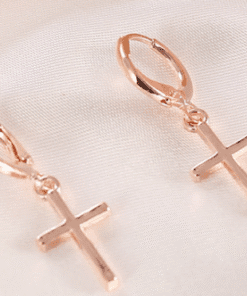 Lightweight cross earrings worn on ear – comfortable faith jewelry