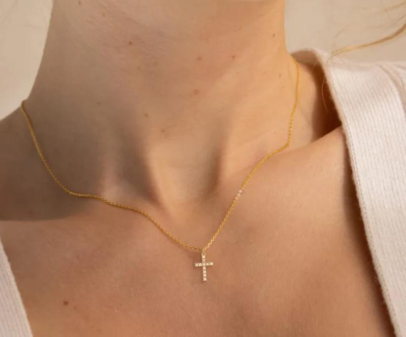 Cross necklace with 18K gold finish and spiritual protection