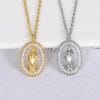 Close-up detail of Virgin Mary pendant in gold – vintage design