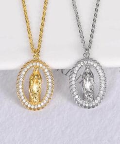 Close-up detail of Virgin Mary pendant in gold – vintage design