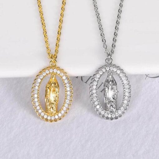 Close-up detail of Virgin Mary pendant in gold – vintage design