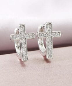 Silver cross necklace with shimmering crystal