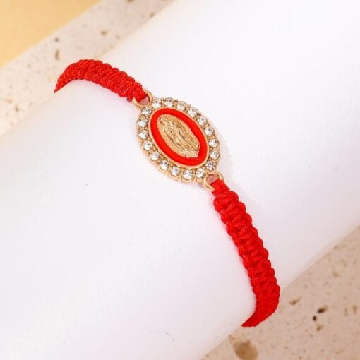 Red Virgin Mary bracelet with sacred symbolism and grace
