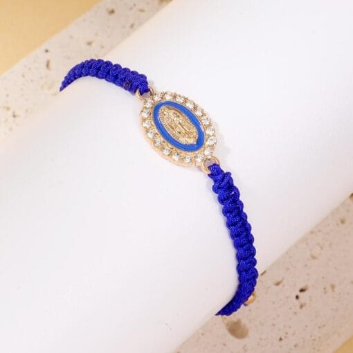 Blue faith bracelet with Mary charm and spiritual elegance