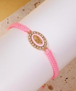 Pink Virgin Mary bracelet with gold finish and holy love