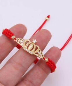 Red Virgin Mary bracelet with crown design and divine blessing