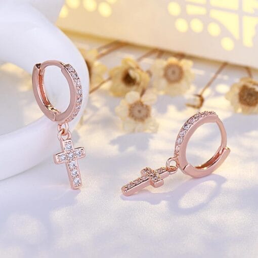 Rose gold drop earrings with cross design
