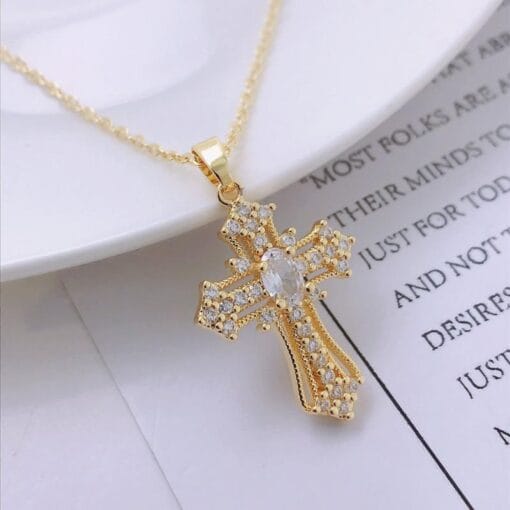 Crystal cross necklace with gold and white inlay